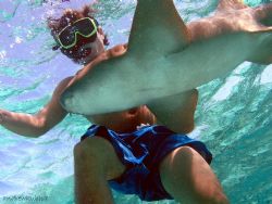 my friend mark swimming above a nurse shark by Andrew Kubica 